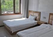 Xiurui Guesthouse at Jinshanling Great Wall - slaapkamer
