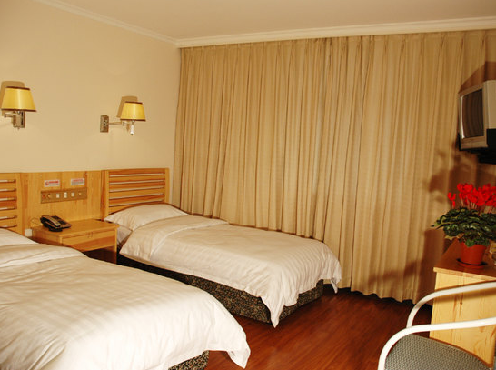 King's Joy Hotel slaapkamer twin