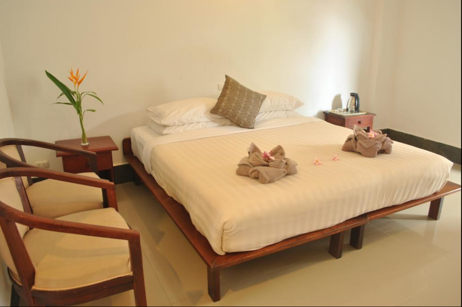 Silver Naga Hotel - slaapkamer