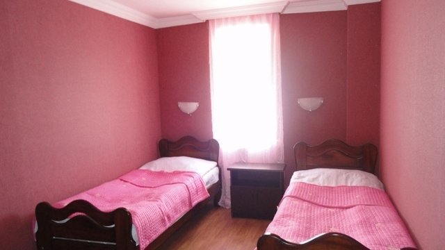 Familiehotel Rusiko's slaapkamer